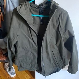 Hooded green Lululemon rain coat